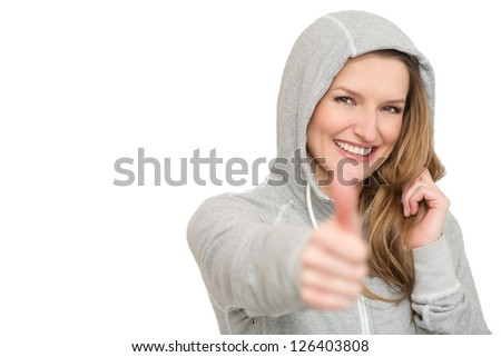 Half face girl laughs and lifts up thumb, on white background