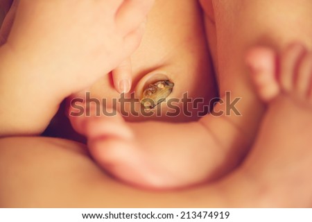 Small delicate little navel or umbilical cord