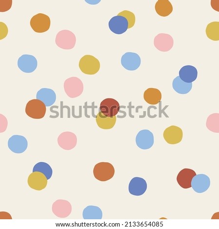 Multicoloured childish confetti spotted vector seamless pattern. Infantile dotted gender neutral colours background. Kid-like mottled surface design for fabric or Scandinavian style nursery.