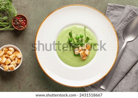 Similar – Foto Bild Leckere Erbsensuppe in Schüsseln auf dem Tisch