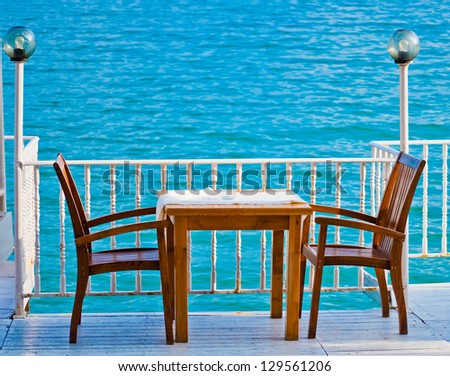 Table in a restaurant with sea view