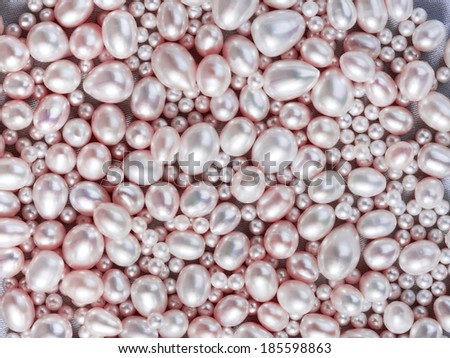 Beautiful light pink pearls background. Horizontal composition.