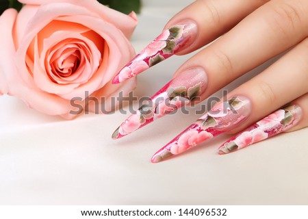 Wedding nail design and pink rose.