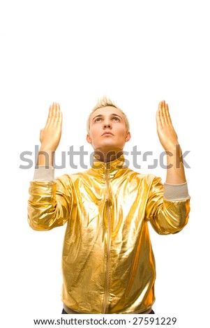 Young Fashion Guy in Gold Costume with gold covered hands isolated on white background