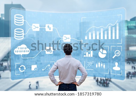 Business Analytics and Data Management System (DMS) giving key insights for corporate strategy. Concept with expert analyst building visualization with KPI and metrics from database information