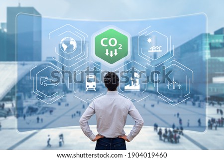 Reduce Carbon Dioxide Emissions to Limit Global Warming and Climate Change. Commitment to Paris Agreement to Lower CO2 levels with Sustainable Development as Renewable Energy and Electric Vehicles