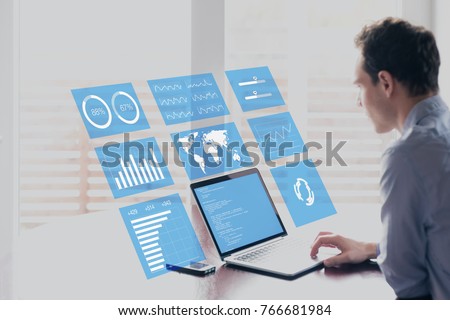 Businessman working with holographic augmented reality (AR) screen technology to analyze business analytics key performance indicator and charts on financial dashboard, fintech concept Stok fotoğraf © 