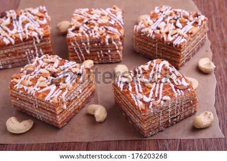pieces of chocolate wafer cake with nuts