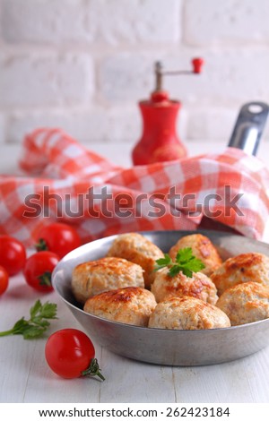 meat balls (cutlets) from turkey meat in a frying pan