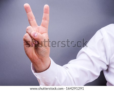 man victory sign
