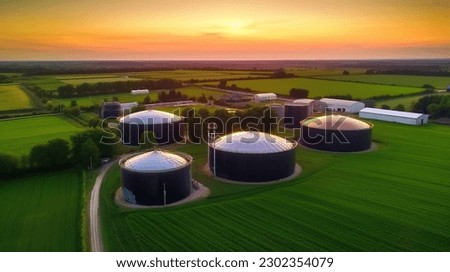 Similar – Image, Stock Photo Aerial view over a little town with wind wheels and a lake in the background of a german countryside.