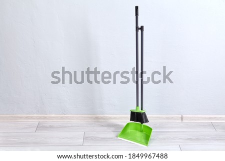 Image, Stock Photo Broom and shovel standing at brick wall