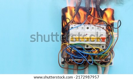 Similar – Image, Stock Photo On fire electric wire plug Receptacle on the concrete wall exposed concrete background with copy space