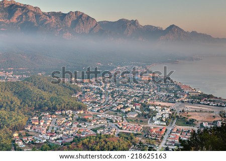 Aerial view of Kemer town, Mediterranean resort, Antalya province, Turkey, in the morning, at dawn, when the fog.
