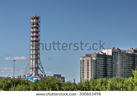 St. Petersburg, Russia - July 6, 2015: New modern gas boiler house in a residential area of the city, district heating plant chimney, modular boiler