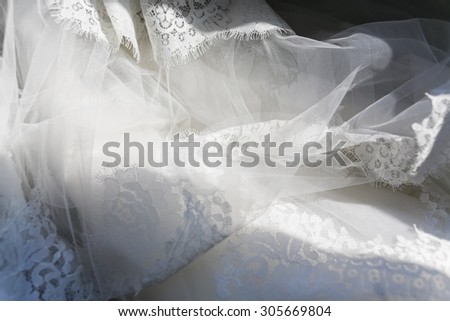wedding dress lace beige background