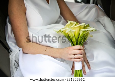 bride with wedding flowers