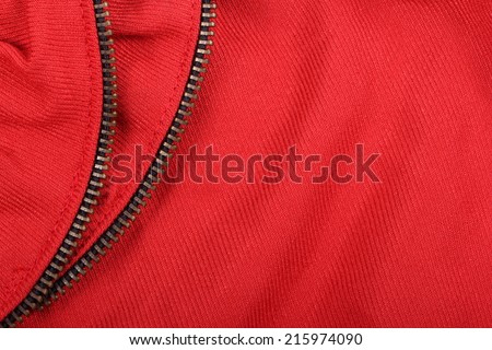 Red fabric with decorating zip