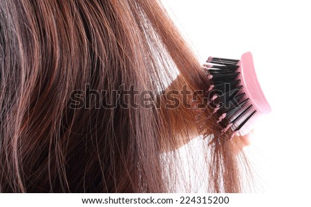 Woman brushing her hair