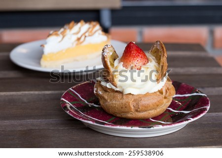 Lemon meringue pie and Cream puff strawberries
