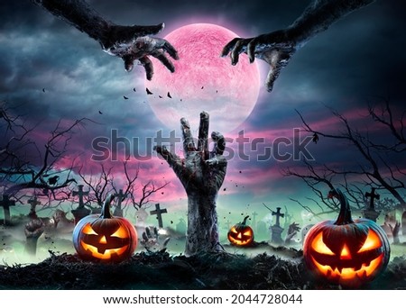 Zombie Hands Rising Out Of A Graveyard With Full Moon And Halloween Pumpkins - Contain 3d Illustration