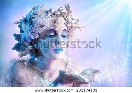 Winter portrait  blowing snowflakes