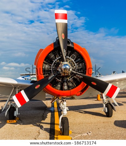 Tampa, Florida May 22nd, 2014 A T3 Texan Aircraft sits on a tarmac in the morning sun.