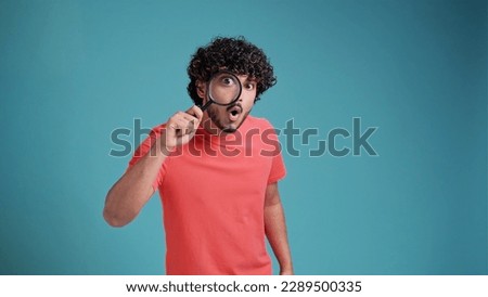 Similar – Image, Stock Photo Man with magnifying glass searches for the ideal employee