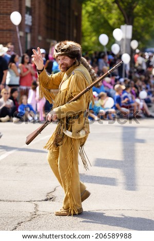 EDMONTON, AB, CANADA-July 18, 2014:  Man in a frontiersman outfit as seen in the K-Days Parade on July 18th, 2014.