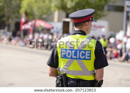 EDMONTON, AB, CANADA-July 18, 2014: Edmonton Police Officer as seen at the K-Days Parade on July 18th, 2014.