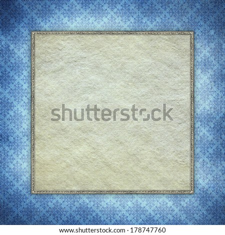 Blank paper sheet in picture frame on blue patterned background