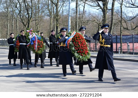 KALININGRAD, RUSSIA - APRIL 09, 2015: Wreath-laying by group of the military personnel in honor of the 70 anniversary of storm of Konigsberg