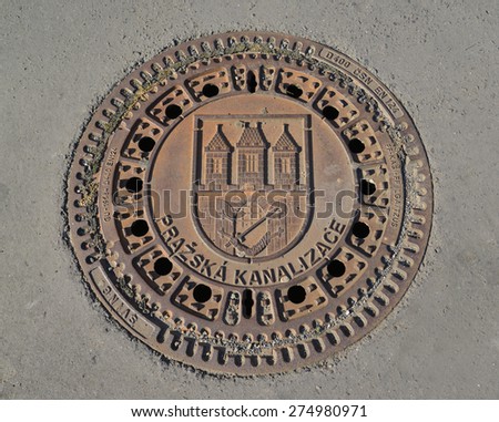 PRAGUE, CZECH REPUBLIC - MAY 25, 2014: - Hatch cover with the coat of arms of the Prague