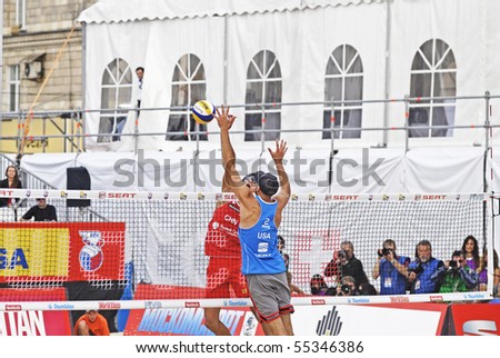 MOSCOW - JUNE 14: SWATCH FIVB Beach Volleyball World Tour: Moscow Final. Penggen Wu and Linyin Xu of China have won a gold medal, on June 14, 2010 in Moscow. Their USA opponents was Todd Rogers and Phil Dalhausser