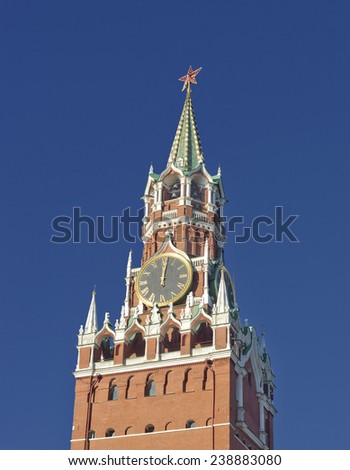 ? historic clock on the Spasskaya Tower of the Moscow Kremlin, Russia, showing twelve o\'clock