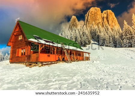 Winter landscape and wooden hut in the mountains,Lonely Rock,Transylvania,Carpathians,Romania,Europe