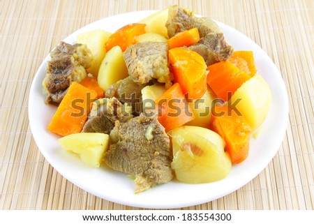 Boiled vegetables with cooked meat.