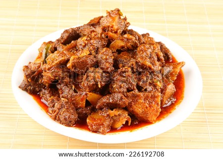 Mutton curry.delicious Kerala style meat curry. It goes well well with ghee rice, appam, parotta, puttu and chappathi.