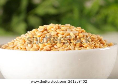 Pile of Toor dal, famous Indian legume also called yellow Pigeon peas,Shallow depth of field photograph.