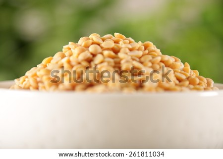 bowl with Toor dal, famous Indian legume also called yellow Pigeon peas,Shallow depth of field photograph.