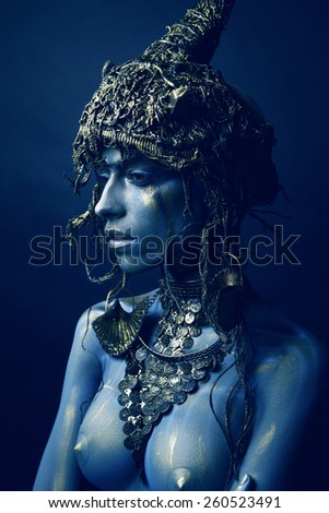Blue woman in original head wear