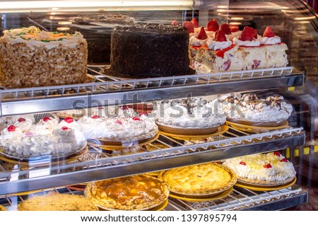 delicious, decedent desserts are show cased in a refrigerated glass case right as one walks into this restaurant. don’t skip dessert! Imagine de stoc © 