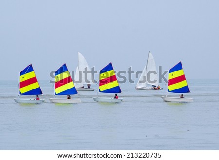 Saint Joseph Michigan, Circa June, 2014.  children ride in sail  boats, as they learn about water safety at the  St Joseph Junior foundation sailing camp