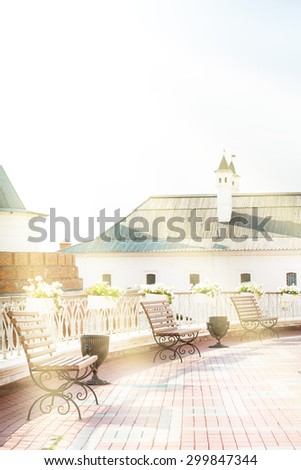 the mosque Kul Sharif . Old courtyard with benches . Sun rays. tranquility and idyll. the lights of a sun