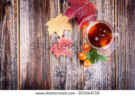 Tea with rosehip . Mineral berries in autumn and winter . Wellness warming drink . environmentally friendly product. traditional medicine . top view