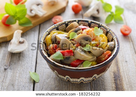 Stewed mushrooms with onion and sweet peppers