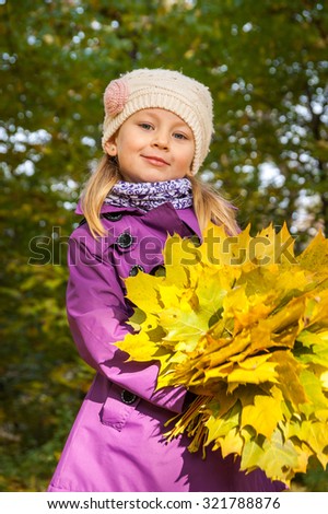 child with yellow leaves, a bouquet of yellow leaves, fallen leaves, maple yellow leaves, yellow leaves of vinok