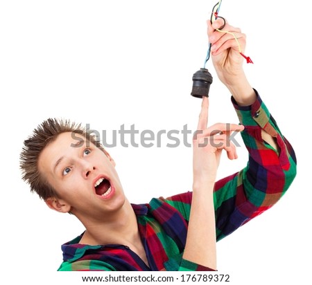Young teenager getting electric shock - conceptual image.