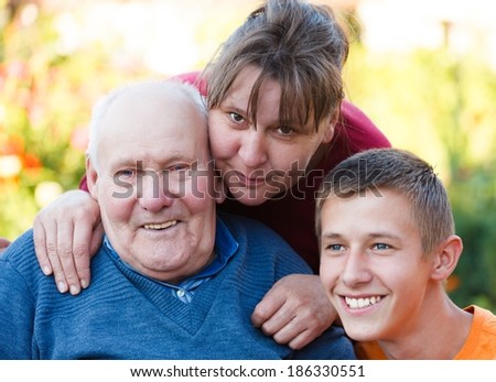 Grandfather being visited by his family.