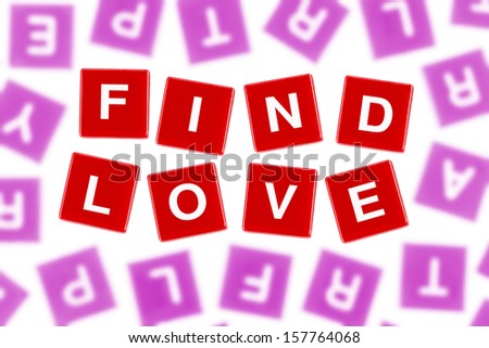 Words FIND LOVE in Clear Focus Against Blurred Letters